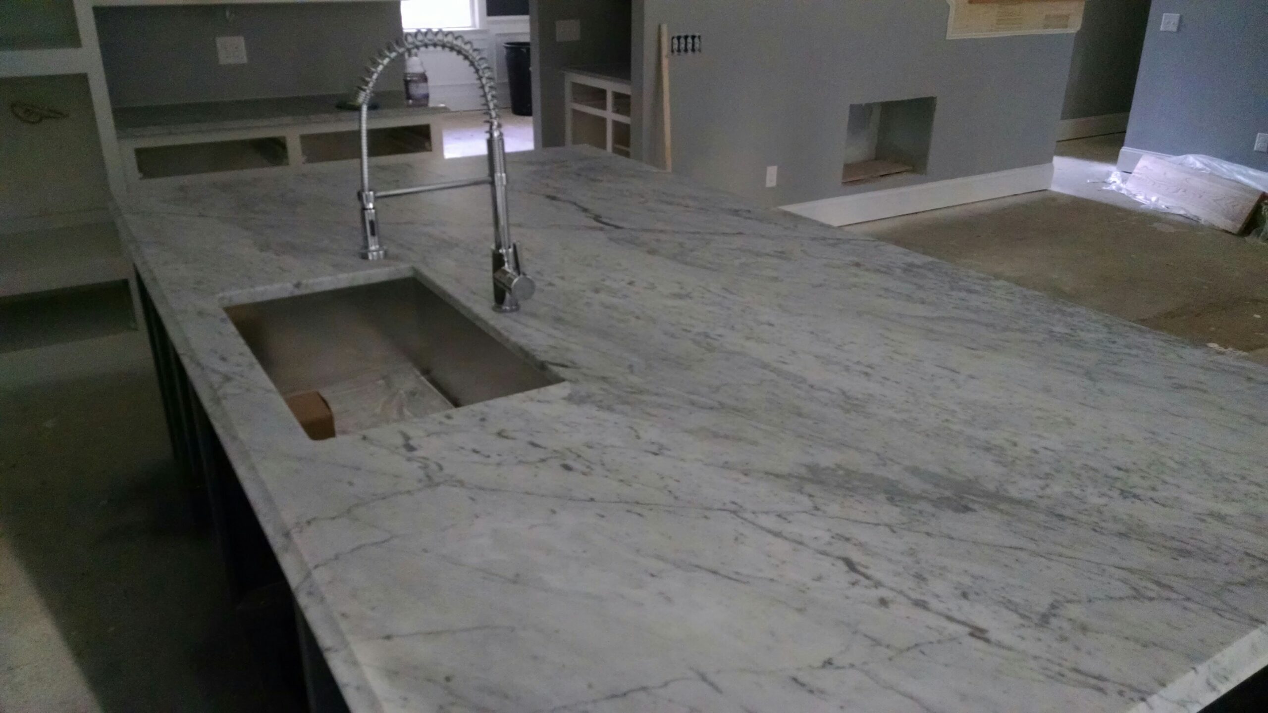 white granite with grey veins